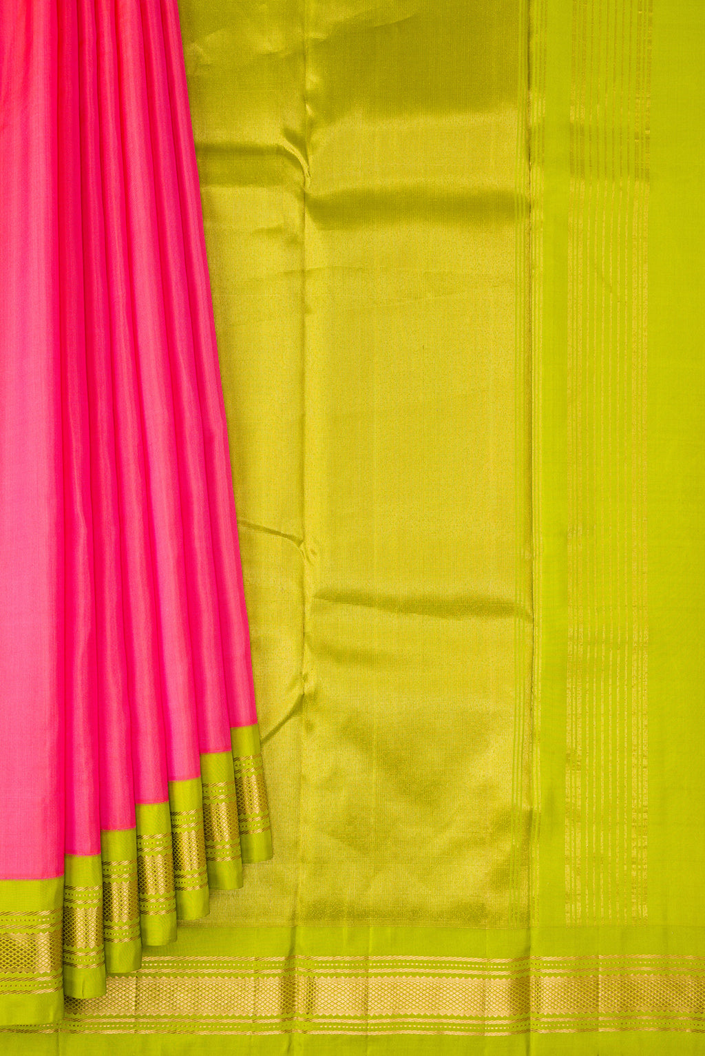 Pleats and pallu of Coral Kanchipuram Silk Saree with Plain Body and Zari Border. 