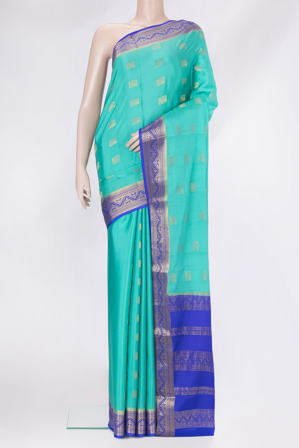 Turquoise Mysore Silk Saree with Zari Butta on the body and Zari Border.  displayed on a mannequin