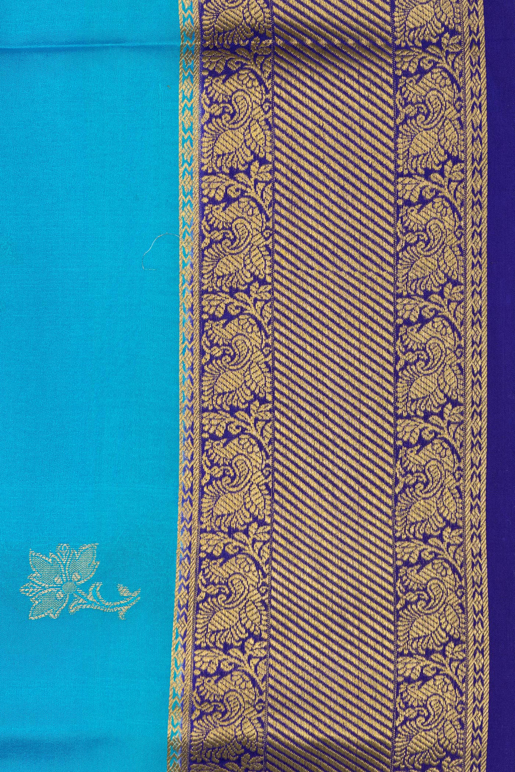 Border image of Sky Blue Dual Tone Mysore Silk Saree with Zari Butta on the body and Zari Border. 