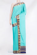 Sky Blue Mysore Silk Saree with Plain Body and Zari Border.  displayed on a mannequin