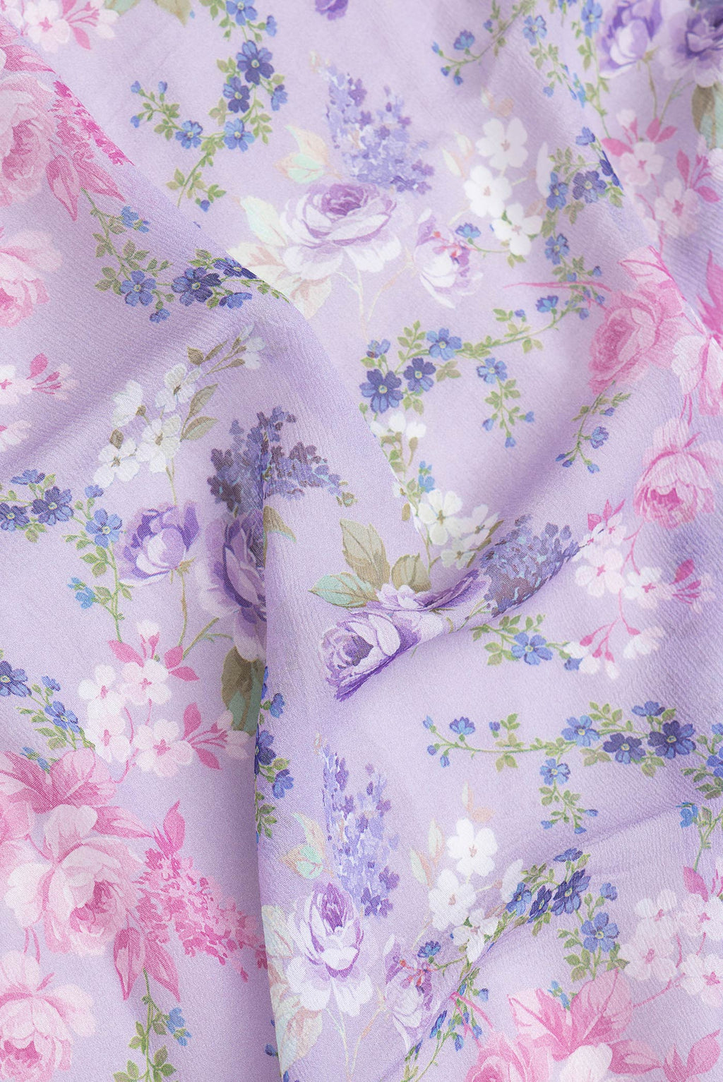 Close up of Lavender Dual Tone Mysore Chiffon Saree with Printed design on the body and Without Border.  displaying folds