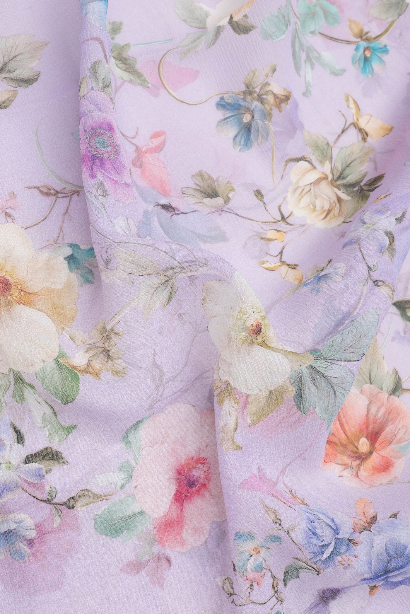 Close up of Lavender Mysore Chiffon Saree with Printed design on the body and Without Border.  displaying folds
