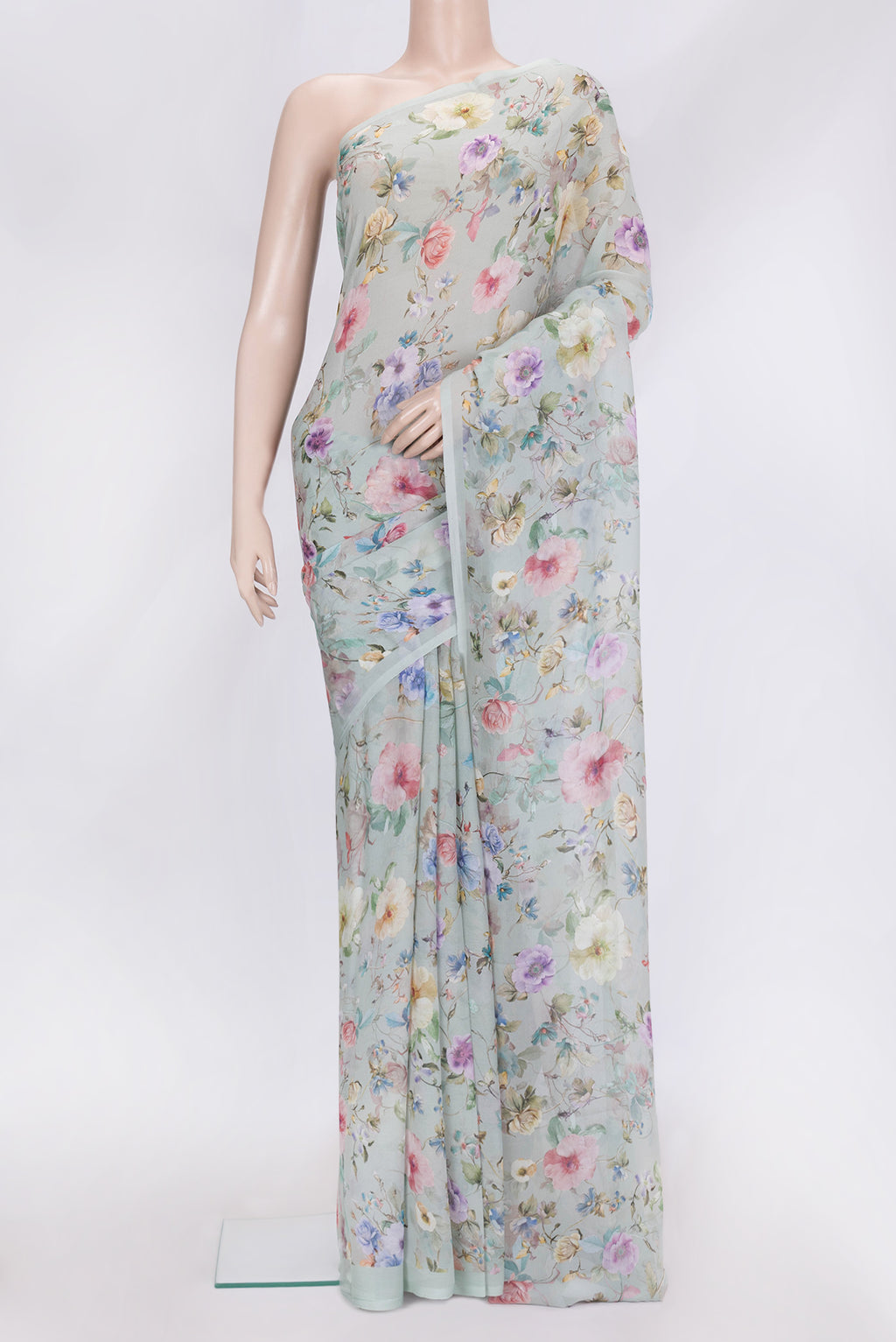 Pista Green Dual Tone Mysore Chiffon Saree with Printed design on the body and Without Border.  displayed on a mannequin