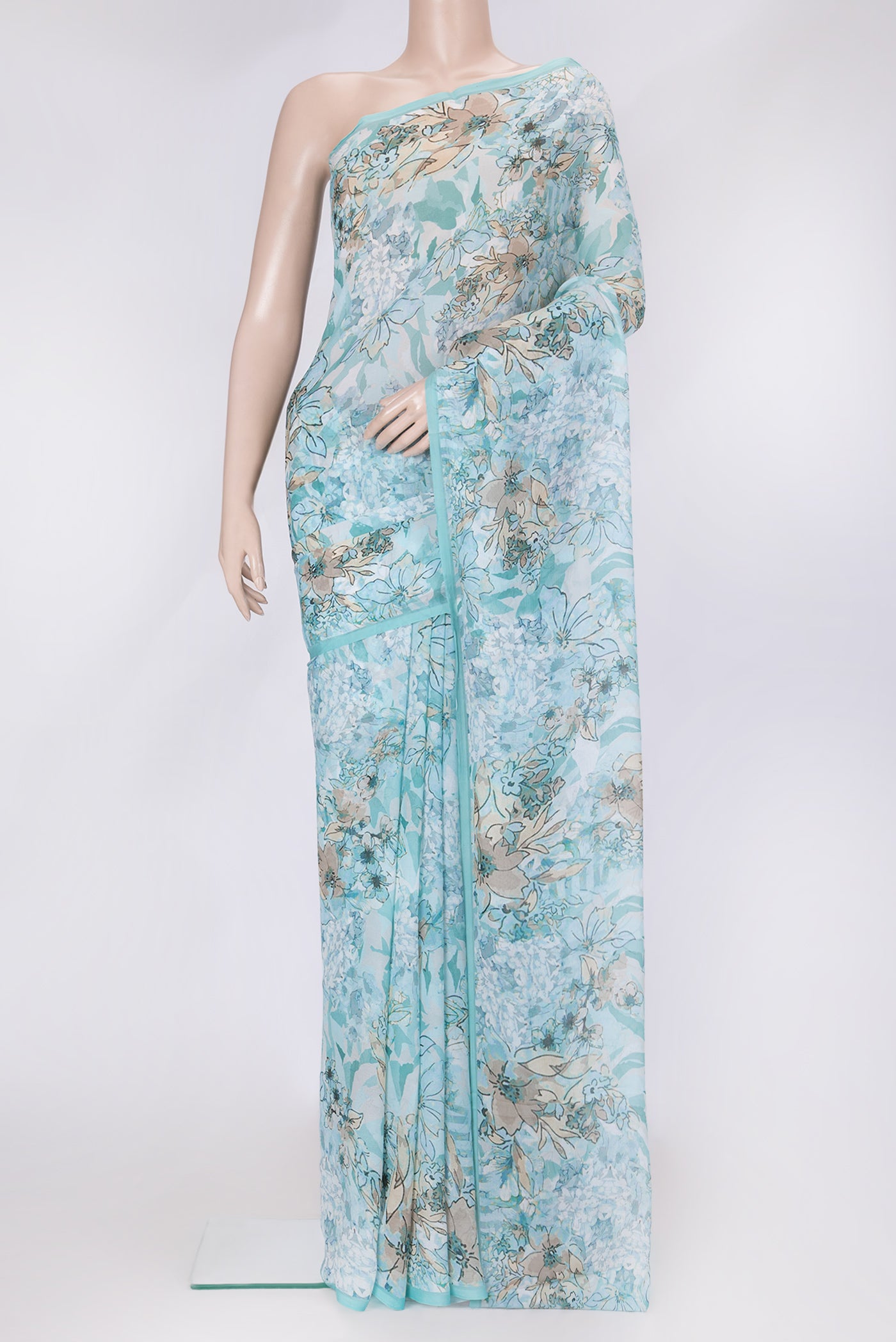 Sea Green Dual Tone Mysore Chiffon Saree with Printed design on the body and Without Border.  displayed on a mannequin