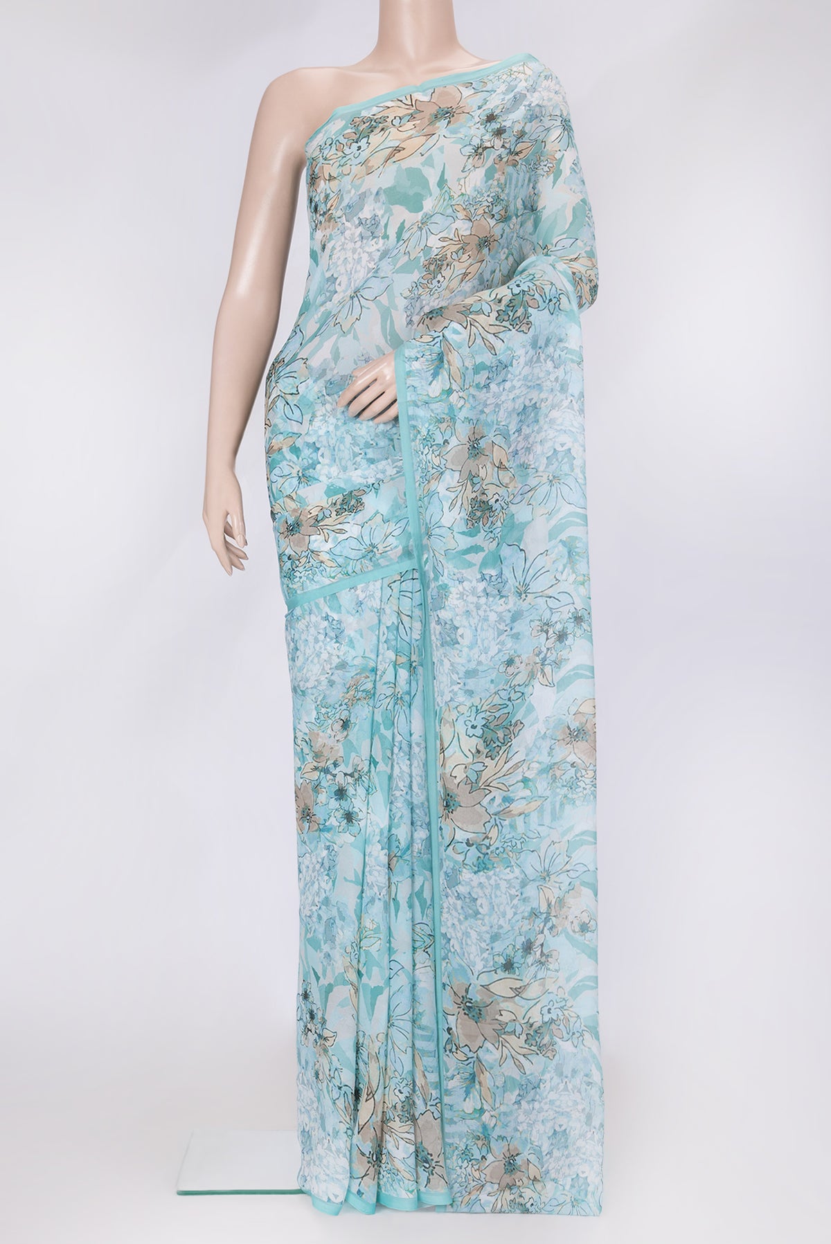 Sea Green Dual Tone Mysore Chiffon Saree with Printed design on the body and Without Border.  displayed on a mannequin