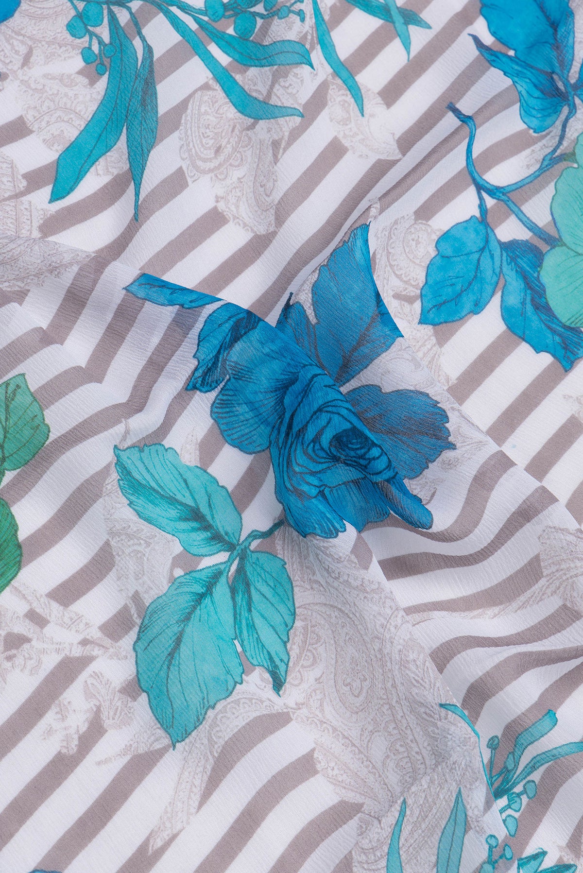 Close up of Off White Dual Tone Mysore Chiffon Saree with Printed design on the body and Plain Border.  displaying folds