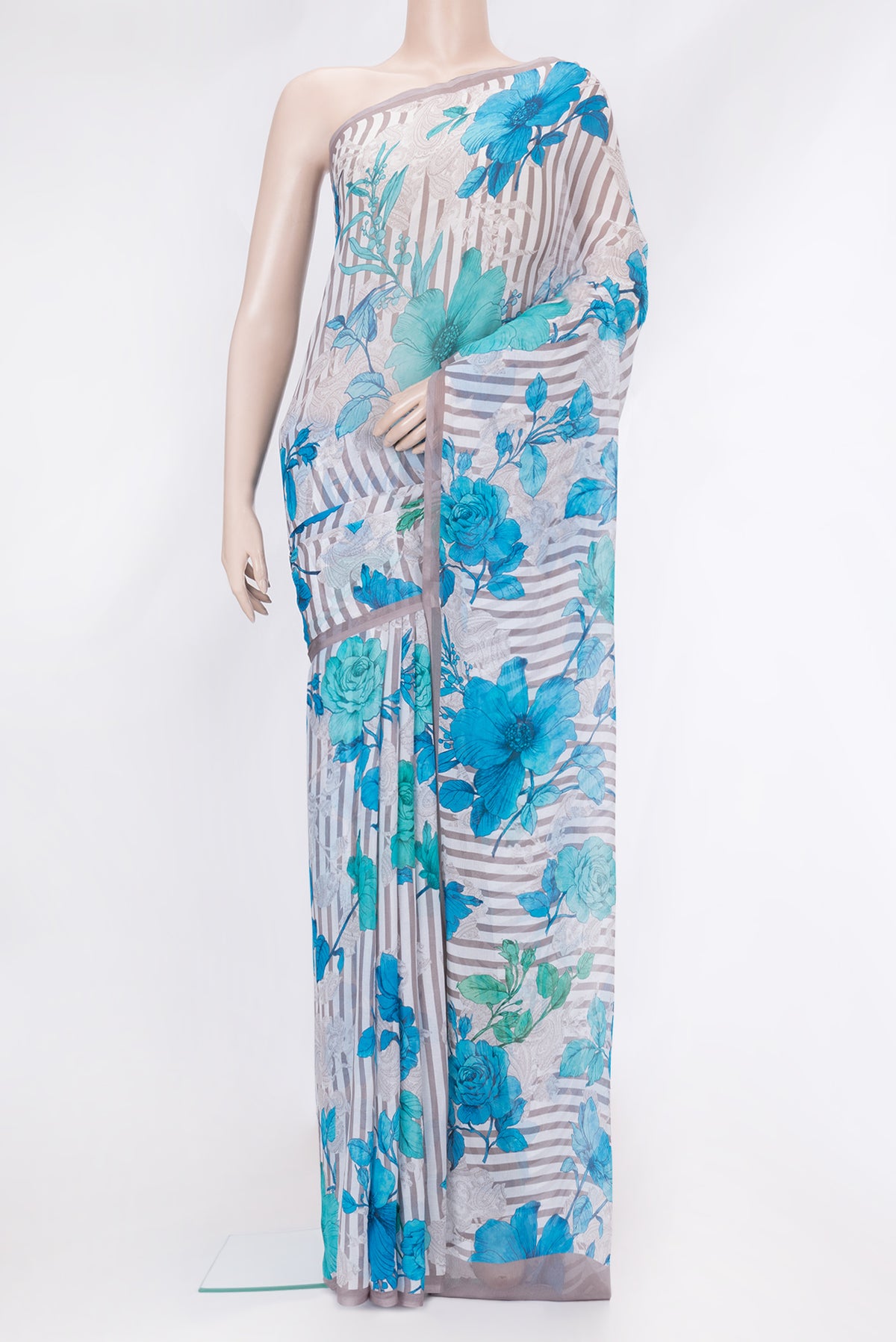 Off White Dual Tone Mysore Chiffon Saree with Printed design on the body and Plain Border.  displayed on a mannequin