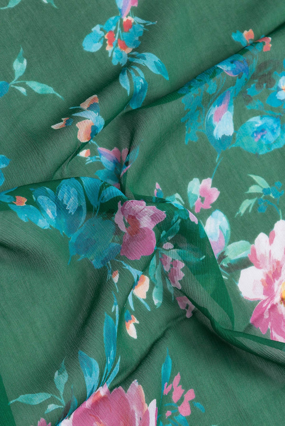 Close up of Green Dual Tone Mysore Chiffon Saree with Printed design on the body and Without Border.  displaying folds
