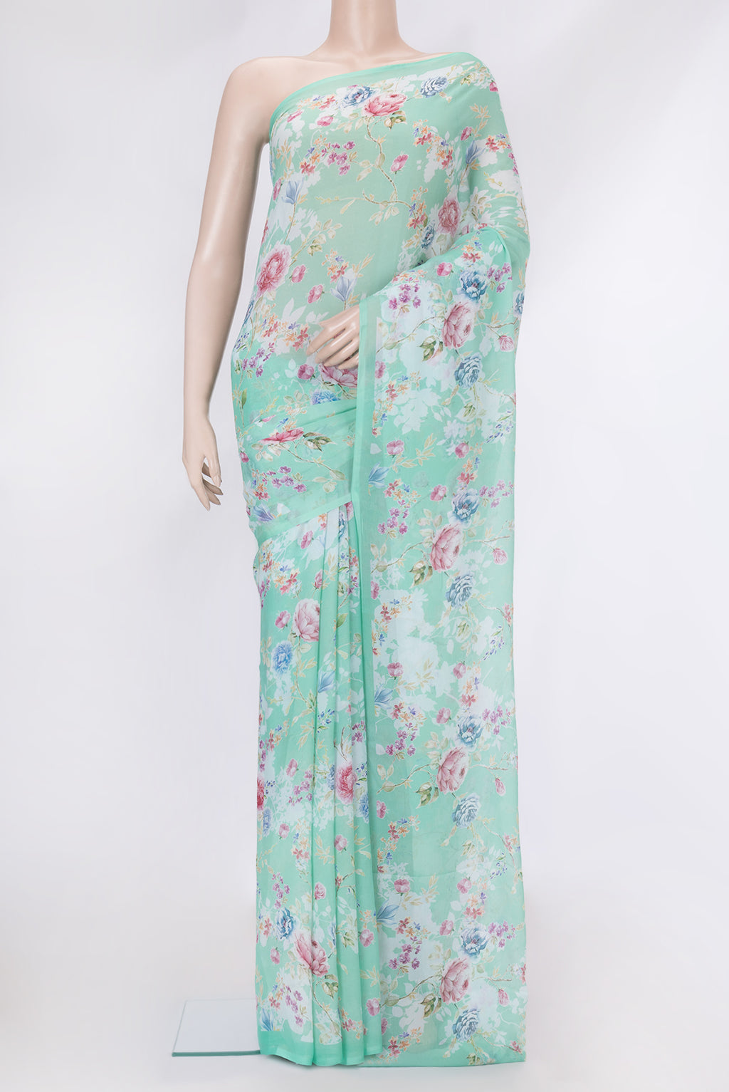 Sea Green Mysore Chiffon Saree with Printed design on the body and Plain Border.  displayed on a mannequin