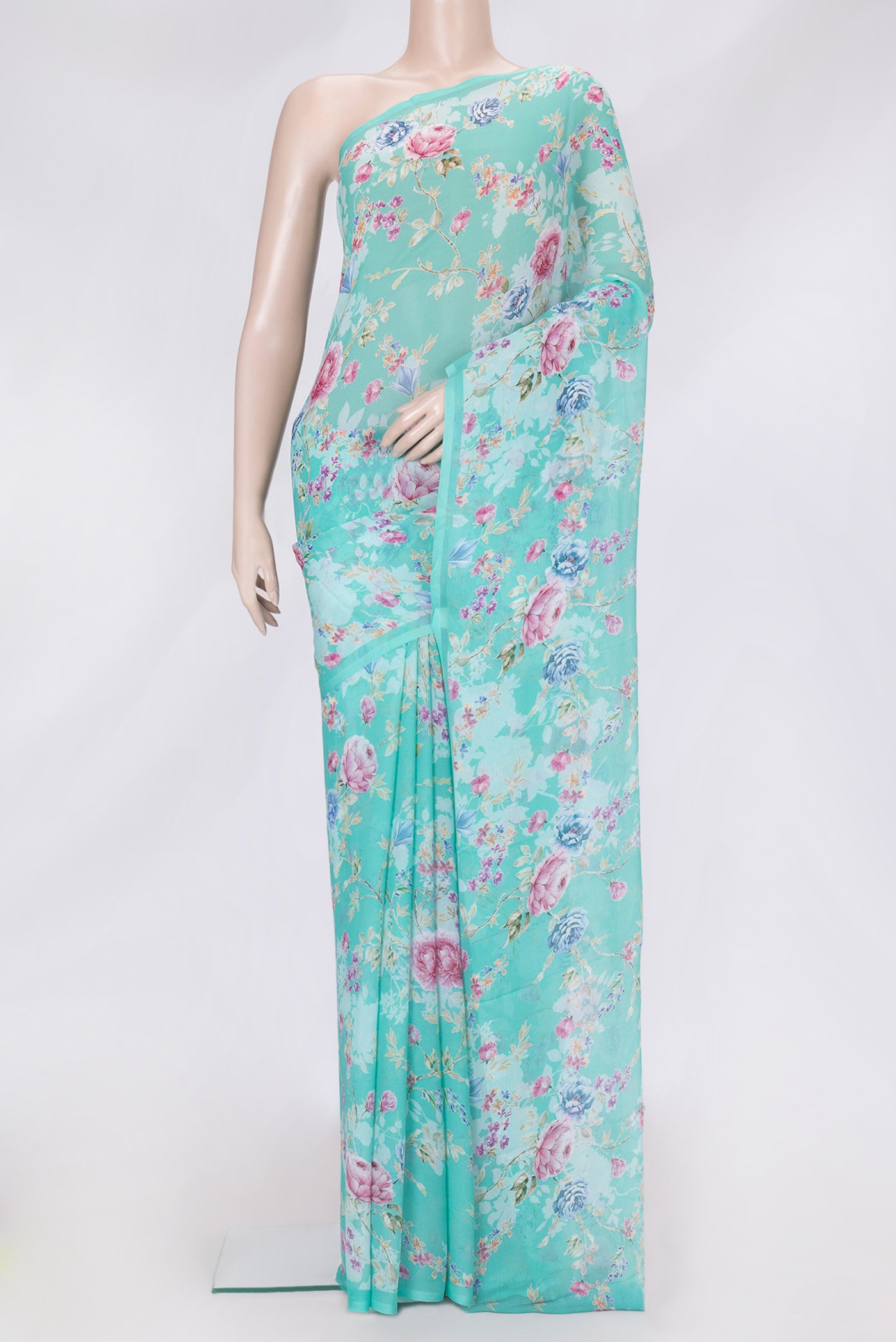 Sea Green Dual Tone Mysore Chiffon Saree with Printed design on the body and Without Border.  displayed on a mannequin