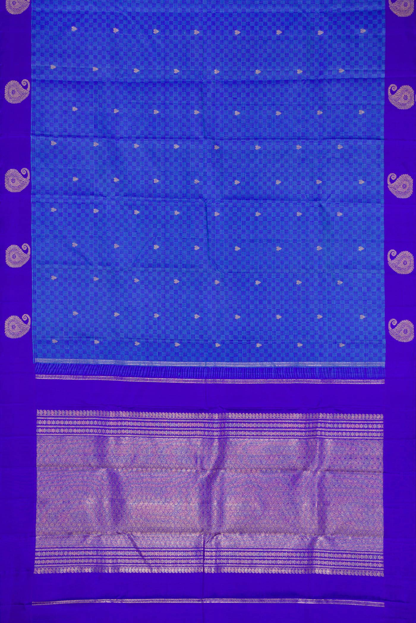 Flat view of Pure Silk Pure Zari Light Blue Dual Tone Kanchipuram Saree with Zari Butta on the body and Fancy Border. 