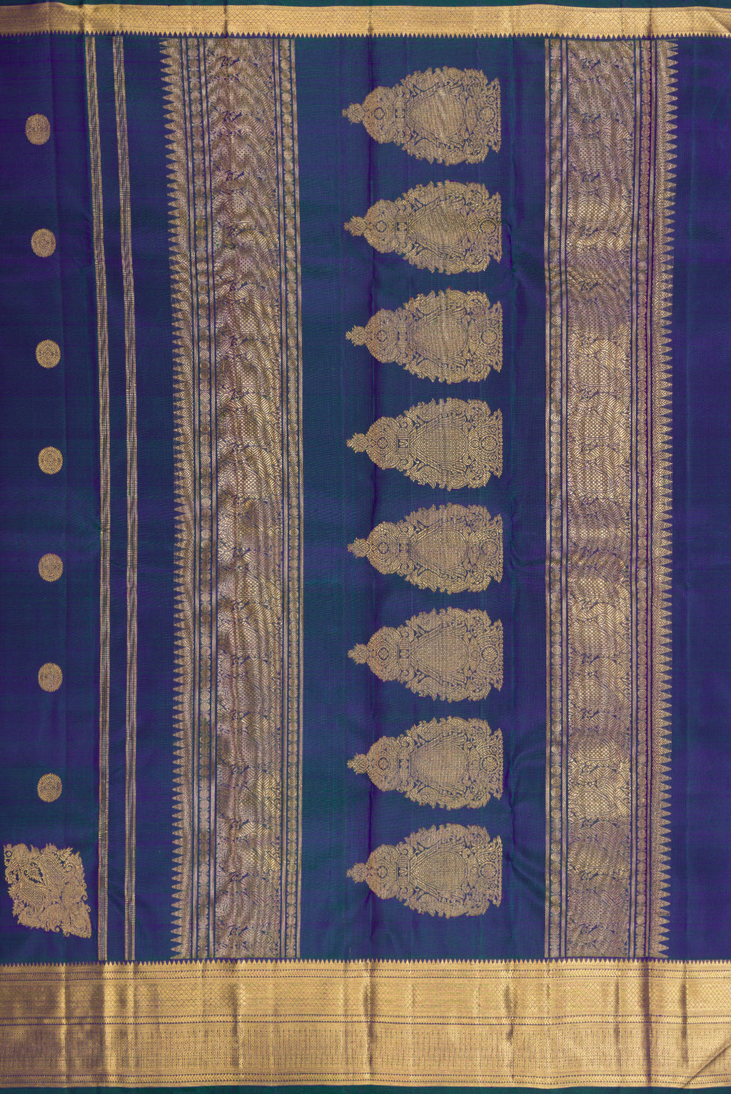 Close up image of the pallu of Pure Silk Pure Zari Peacock Blue Dual Tone Kanjivaram Saree with Zari Butta on the body and Zari Border. 