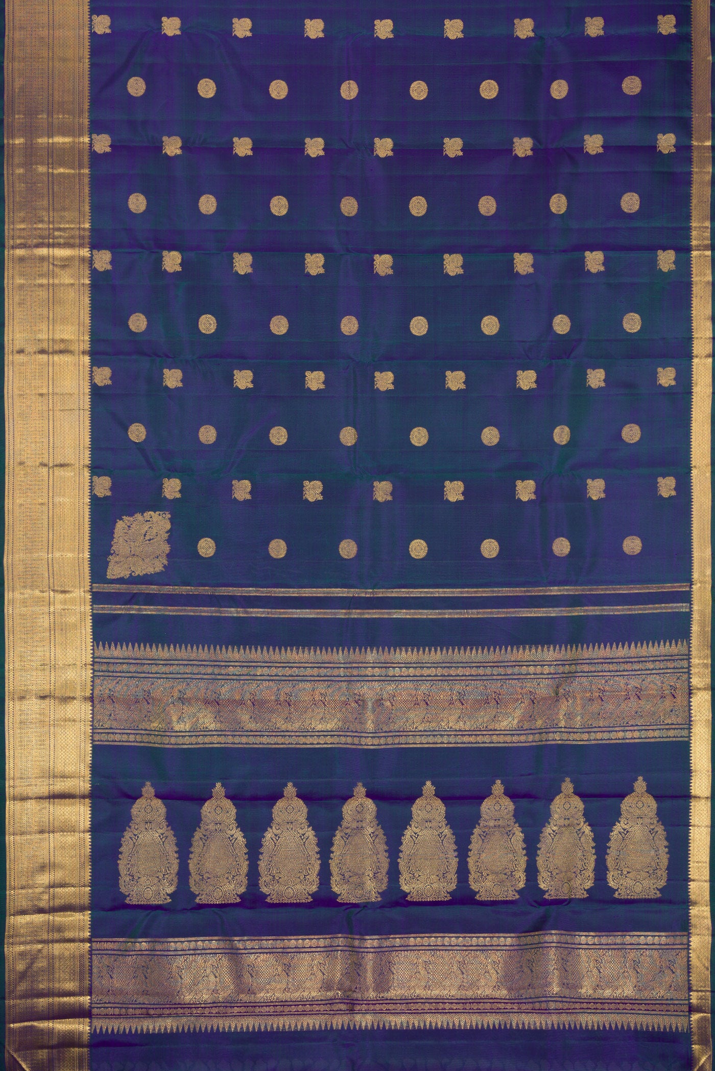 Flat view of Pure Silk Pure Zari Peacock Blue Dual Tone Kanjivaram Saree with Zari Butta on the body and Zari Border. 