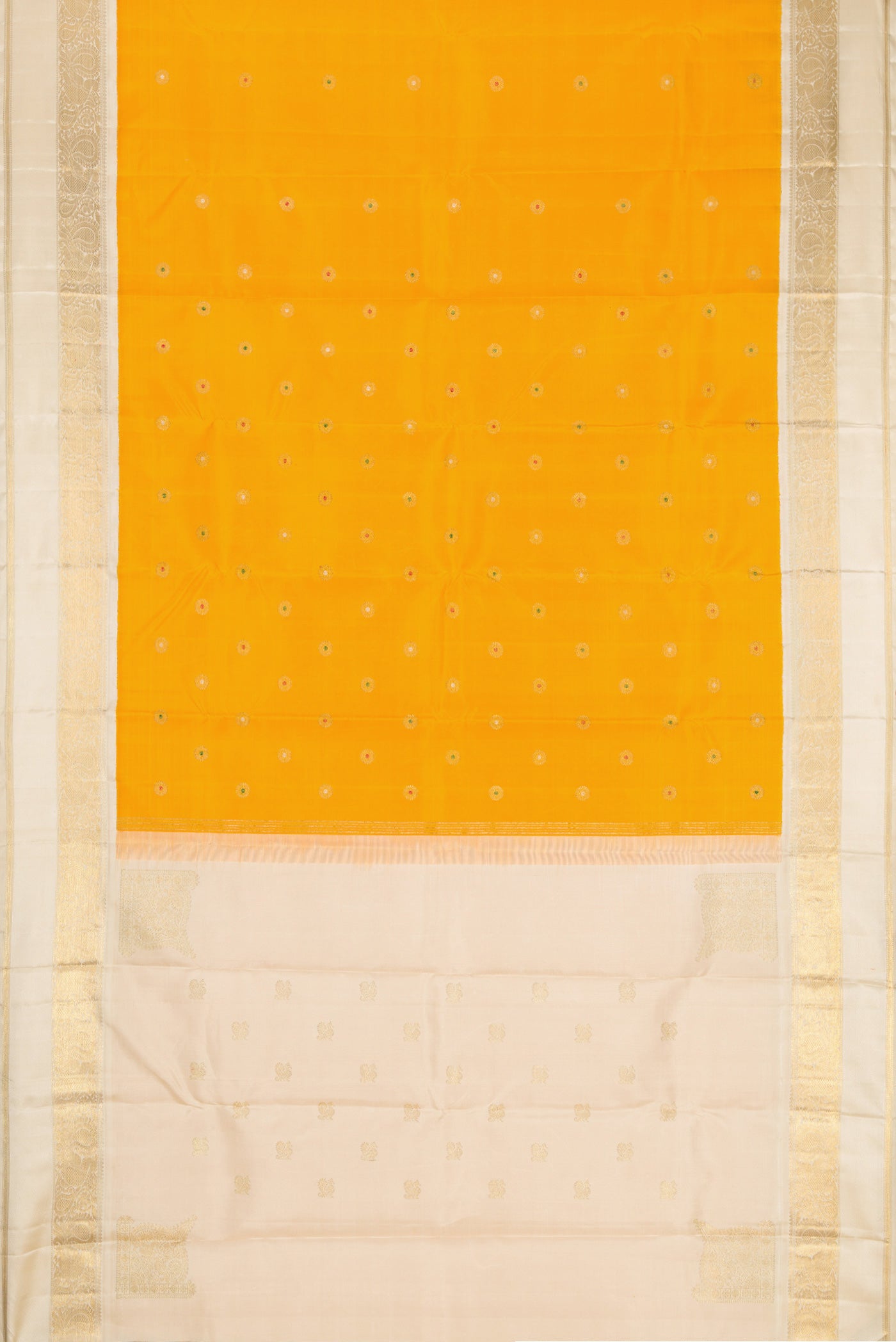 Flat view of Pure Silk Pure Zari Mustard Dual Tone Kanjivaram Saree with Zari And Thread Butta on the body and Zari Border. 