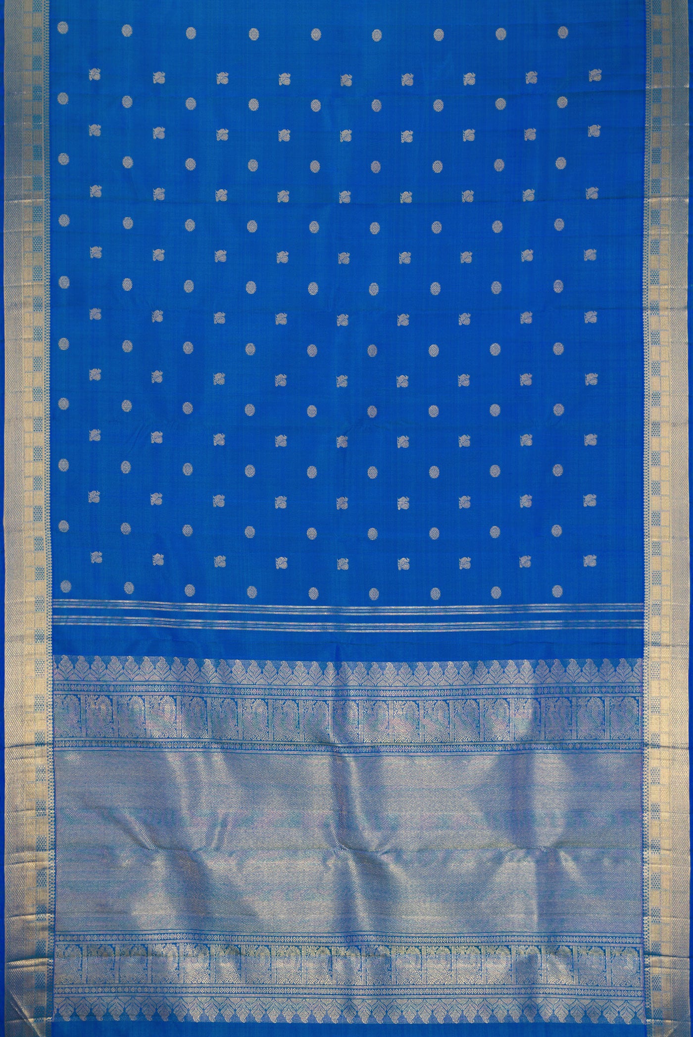 Flat view of Pure Silk Pure Zari Peacock Blue Dual Tone Kanjivaram Saree with Zari Butta on the body and Zari Border. 
