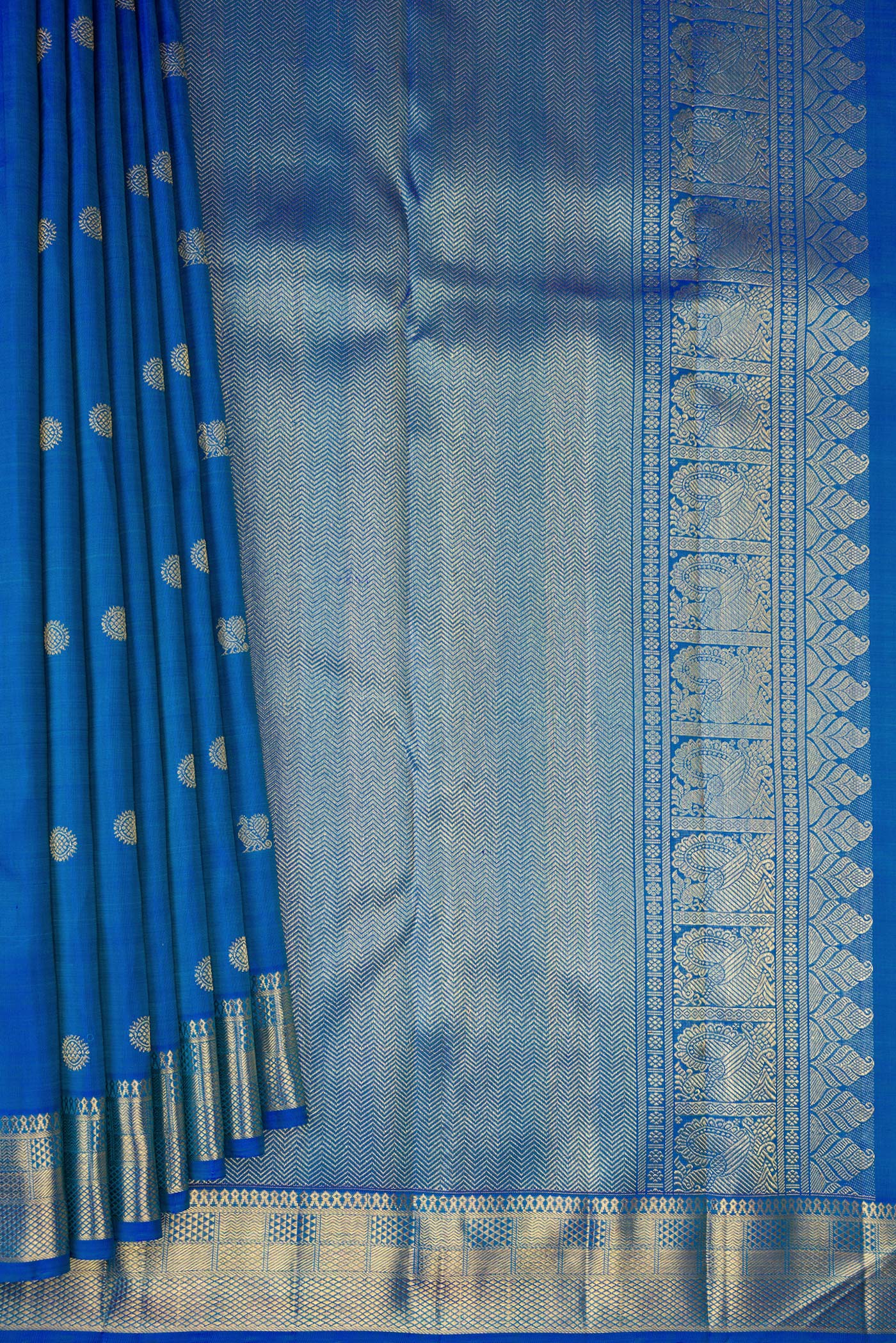 Pleats and pallu of Pure Silk Pure Zari Peacock Blue Dual Tone Kanjivaram Saree with Zari Butta on the body and Zari Border. 