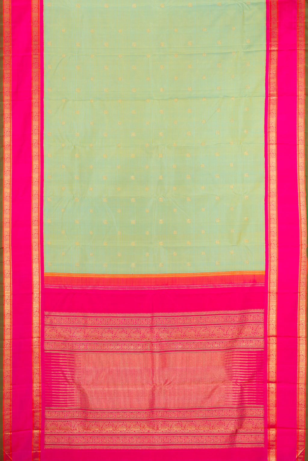 Flat view of Pure Silk Pure Zari Pista Green Kanjivaram Saree with Zari Butta on the body and Zari Border. 