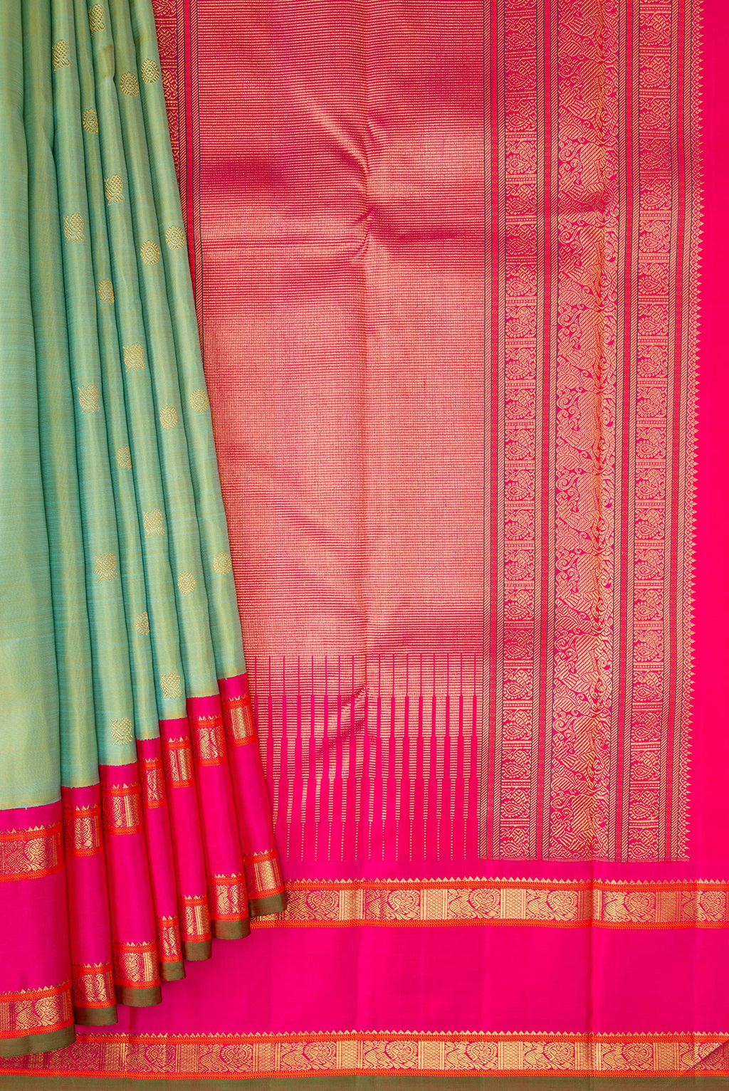Pleats and pallu of Pure Silk Pure Zari Pista Green Kanjivaram Saree with Zari Butta on the body and Zari Border. 
