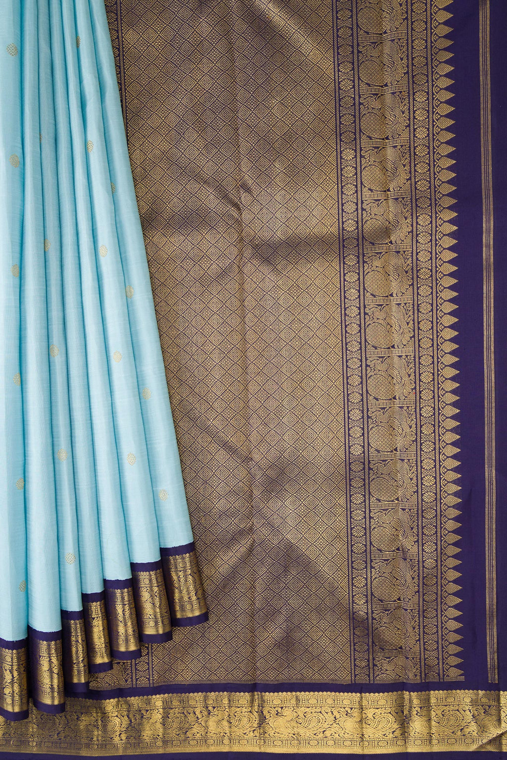 Pleats and pallu of Pure Silk Pure Zari Sky Blue Dual Tone Kanjivaram Saree with Zari Butta on the body and Zari Border. 