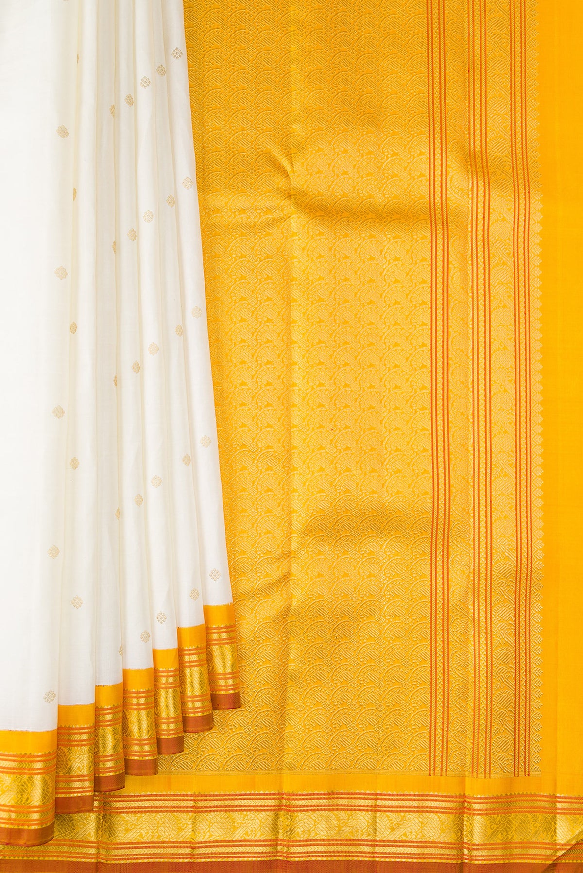 Pleats and pallu of Pure Silk Pure Zari Off White Kanjivaram Saree with Zari Butta on the body and Zari Border. 