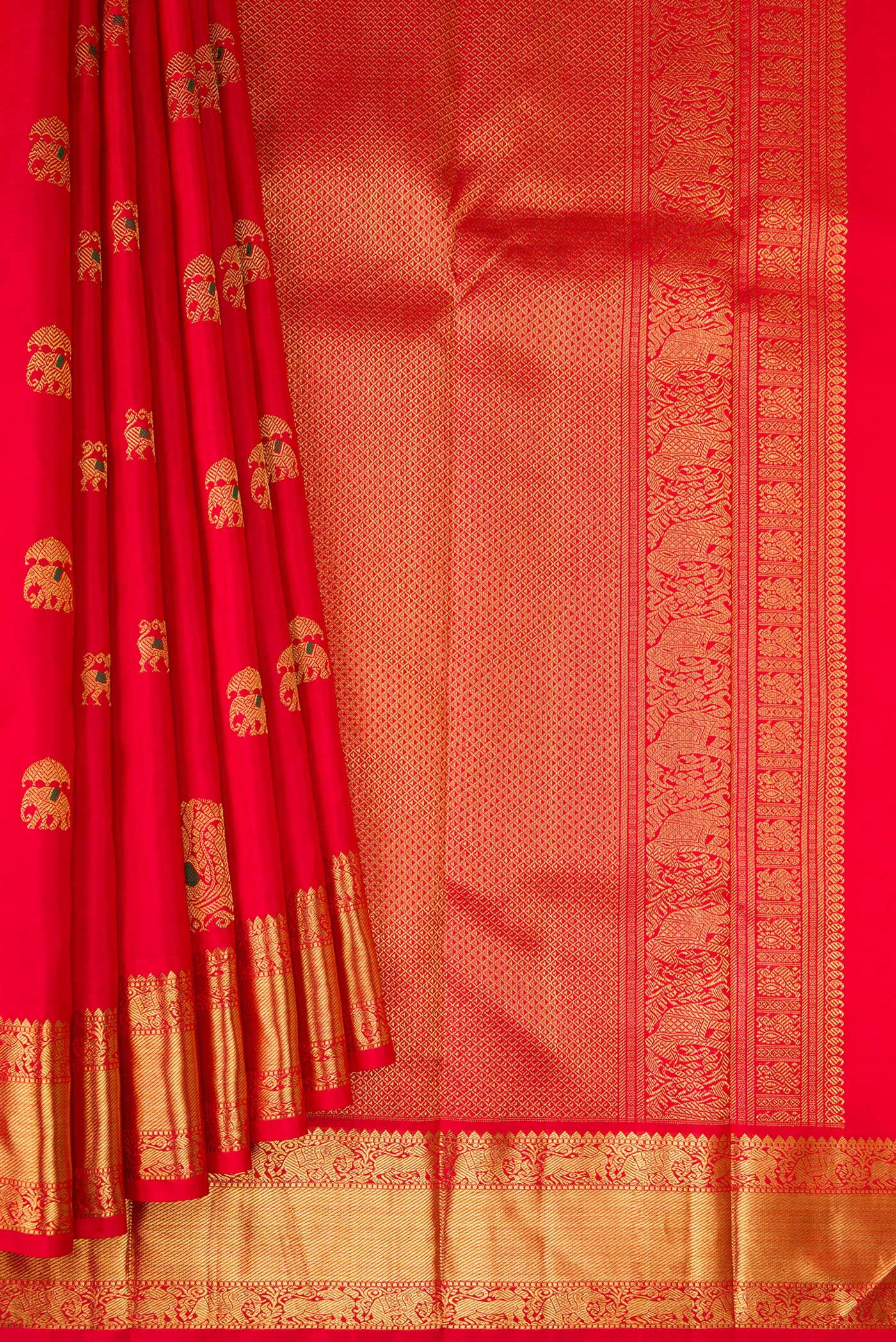 Pleats and pallu of Pure Silk Pure Zari Red Dual Tone Kanjivaram Saree with Zari And Thread Butta on the body and Zari Border. 
