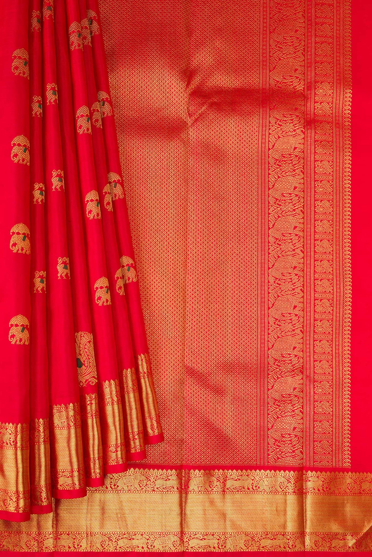 Pleats and pallu of Pure Silk Pure Zari Red Dual Tone Kanjivaram Saree with Zari And Thread Butta on the body and Zari Border. 