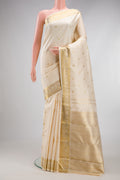 Pure Silk Pure Zari Cream Kanjivaram Saree with Zari Butta on the body and Fancy Border.  displayed on a mannequin