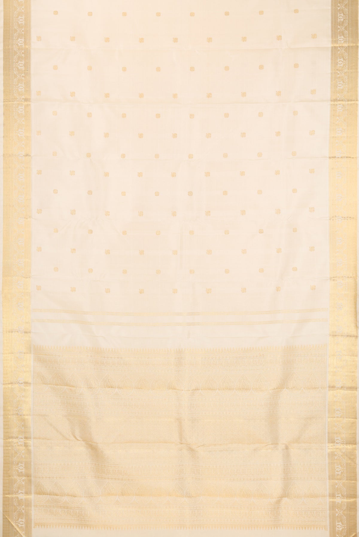 Flat view of Pure Silk Pure Zari Cream Kanjivaram Saree with Zari Butta on the body and Fancy Border. 