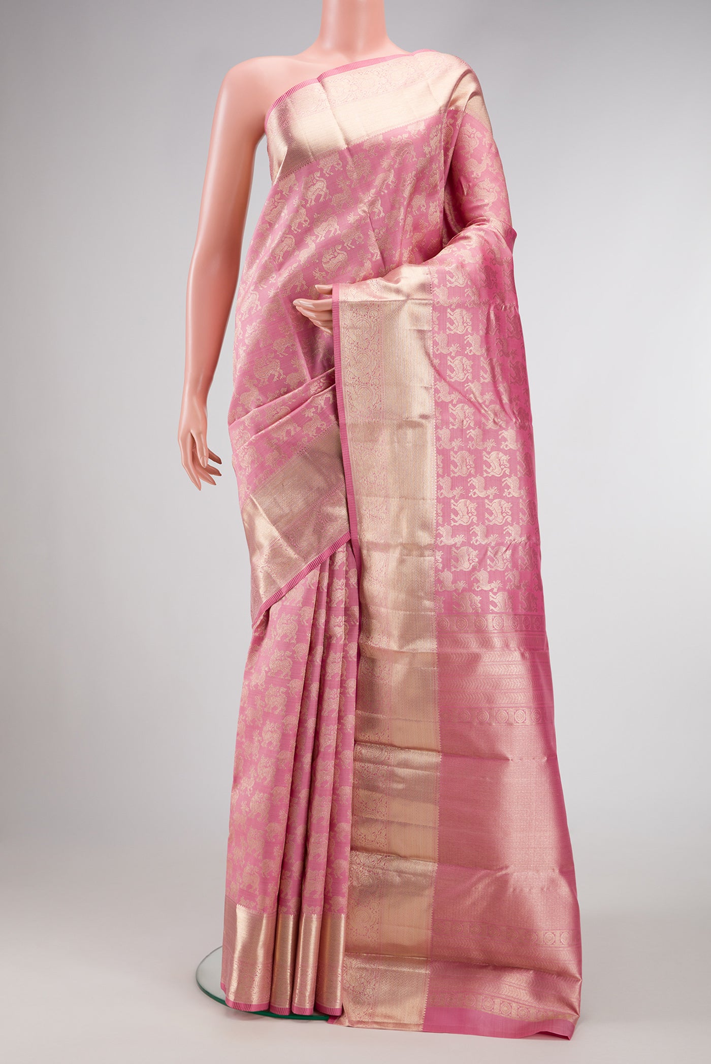 Pink Dual Tone Kanchipuram Silk Saree with Zari Brocade on the body and Zari Border.  displayed on a mannequin