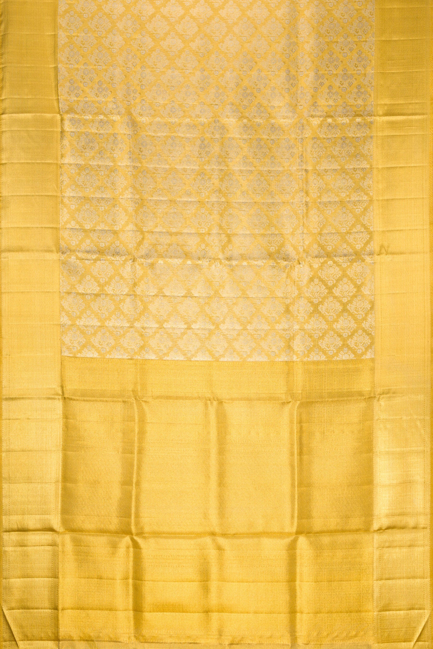 Flat view of Gold Dual Tone Kanjivaram Tissue Silk Saree with Zari Brocade on the body and Zari Border. 