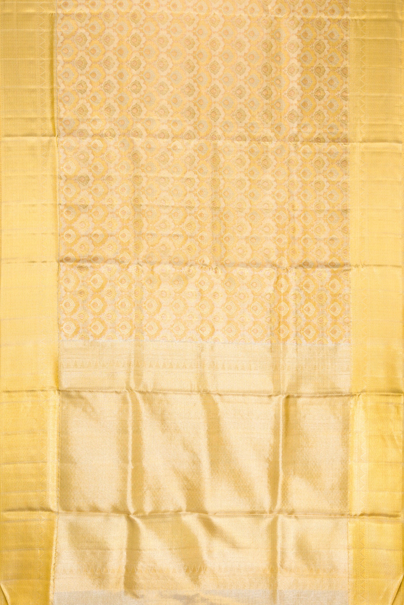 Flat view of Gold Dual Tone Kanjivaram Tissue Silk Saree with Zari Brocade on the body and Zari Border. 