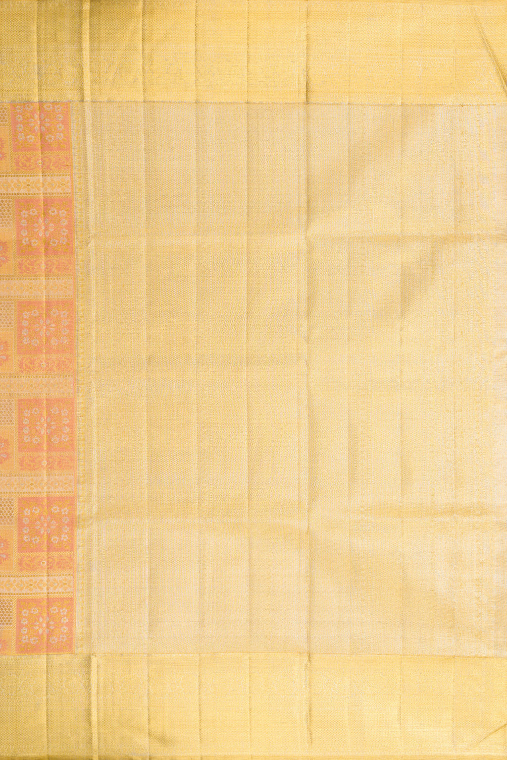 Close up image of the pallu of Rose Gold Dual Tone Kanjivaram Tissue Silk Saree with Zari Brocade on the body and Zari Border. 