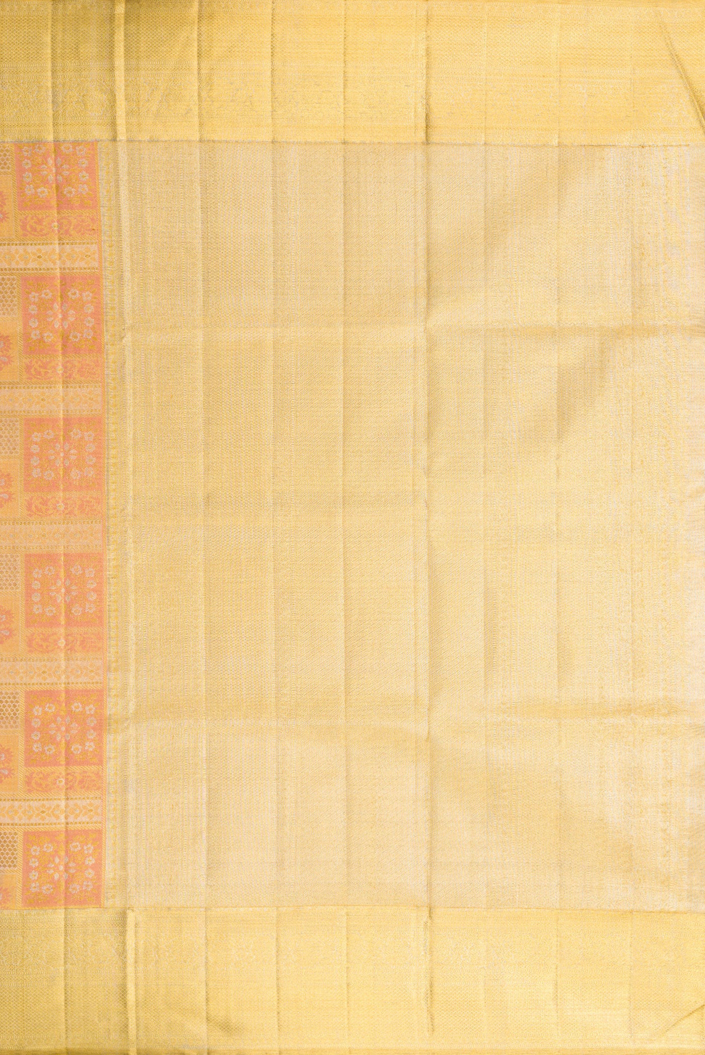 Close up image of the pallu of Rose Gold Dual Tone Kanjivaram Tissue Silk Saree with Zari Brocade on the body and Zari Border. 