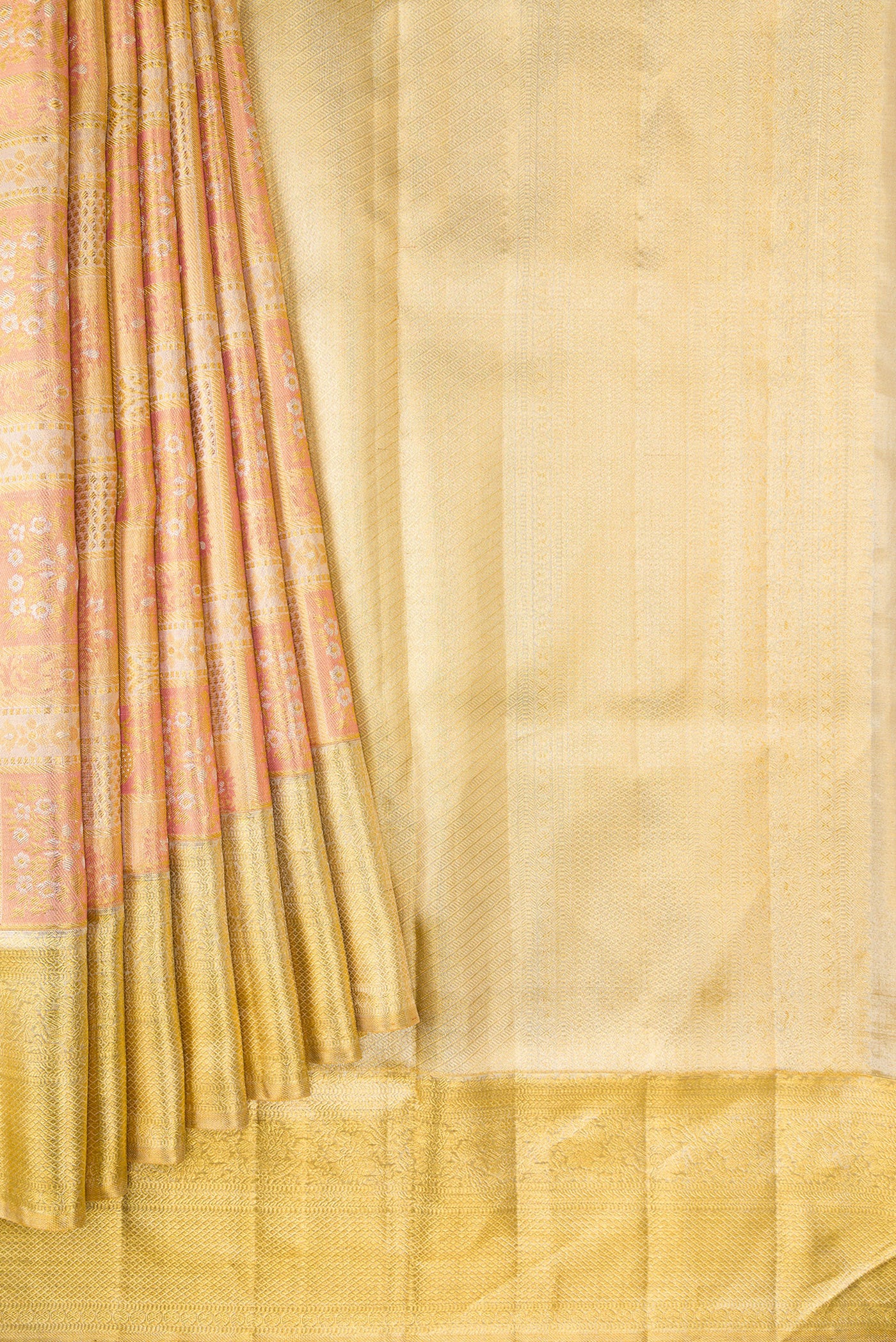 Pleats and pallu of Rose Gold Dual Tone Kanjivaram Tissue Silk Saree with Zari Brocade on the body and Zari Border. 