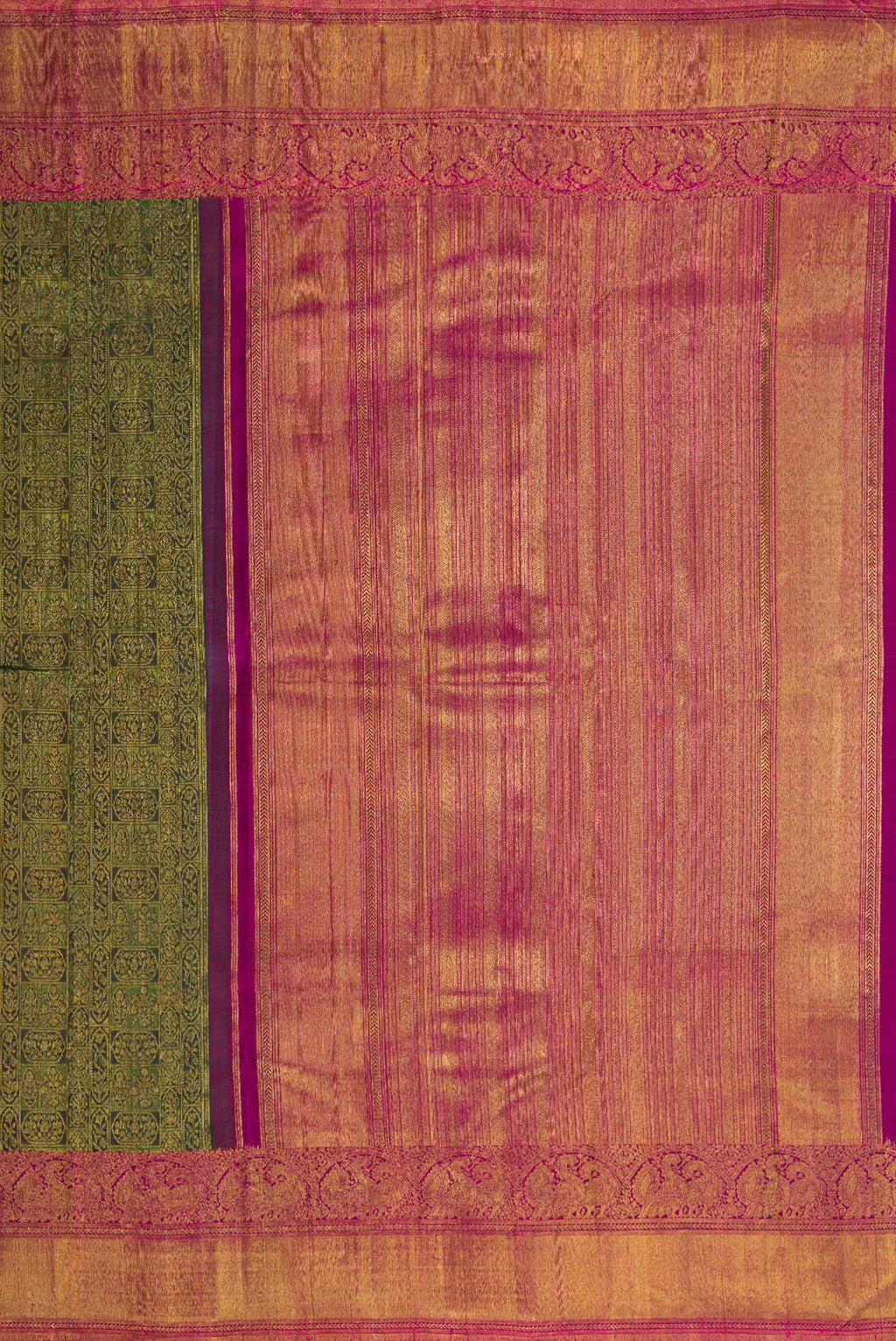 Close up image of the pallu of Green Dual Tone Kanchipuram Silk Saree with Zari Brocade on the body and Zari Border. 