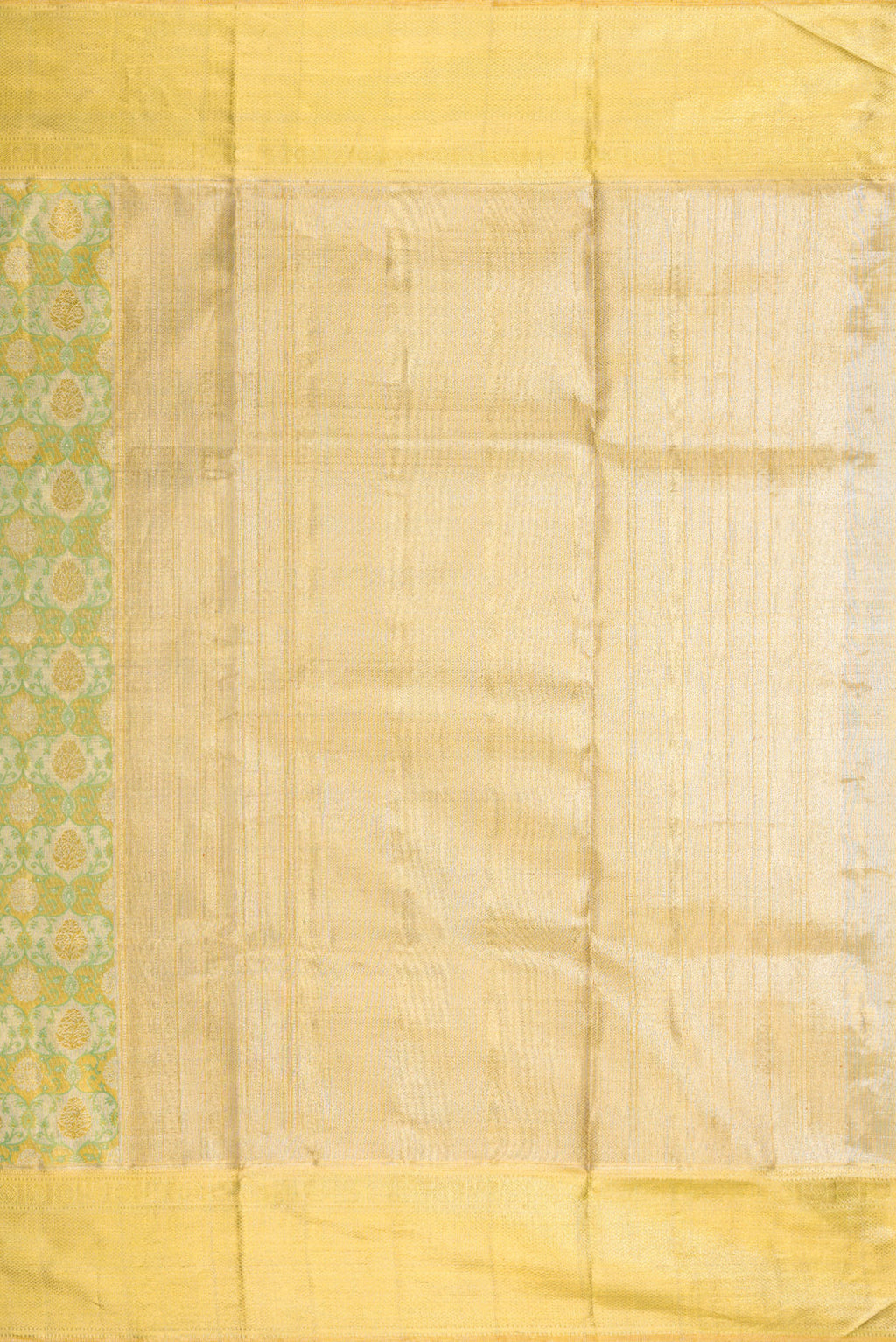 Close up image of the pallu of Pista Green Dual Tone Kanjivaram Tissue Silk Saree with Zari Brocade on the body and Zari Border. 