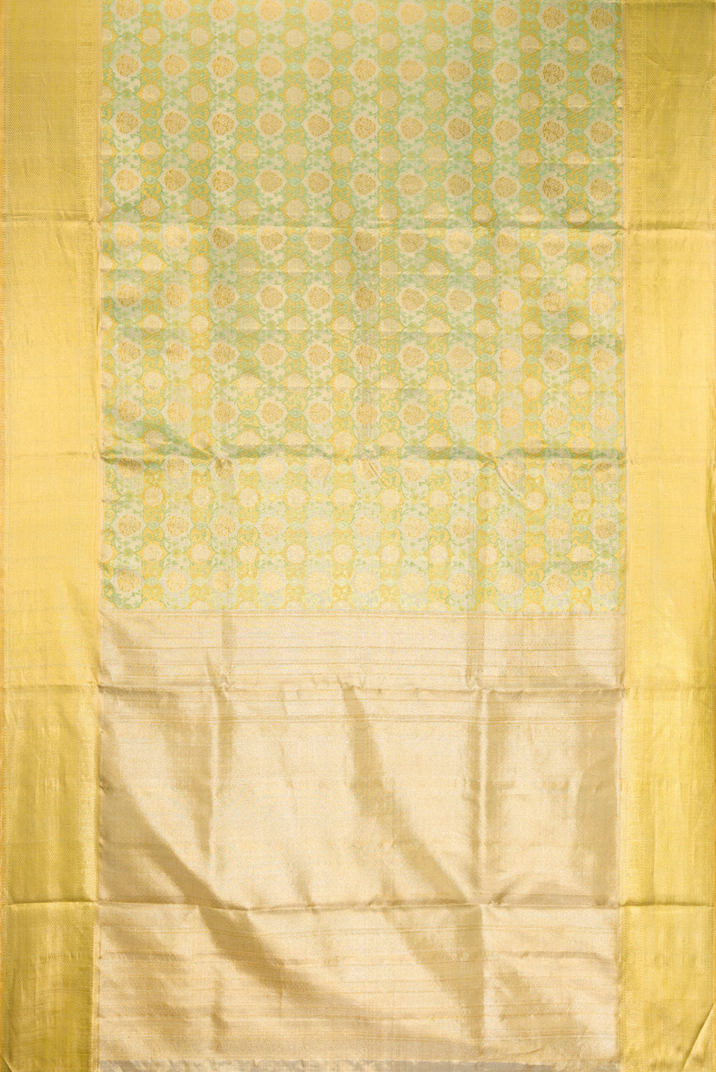Flat view of Pista Green Dual Tone Kanjivaram Tissue Silk Saree with Zari Brocade on the body and Zari Border. 