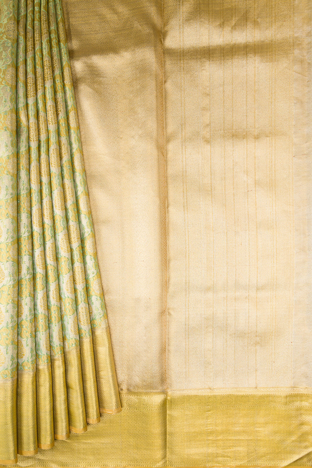 Pleats and pallu of Pista Green Dual Tone Kanjivaram Tissue Silk Saree with Zari Brocade on the body and Zari Border. 