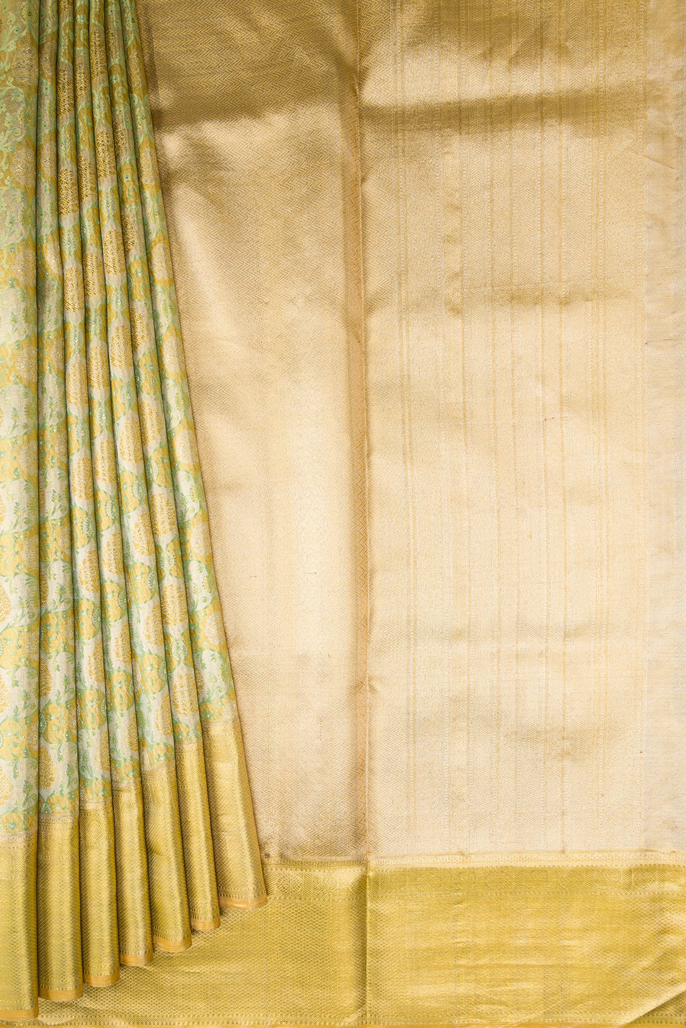 Pleats and pallu of Pista Green Dual Tone Kanjivaram Tissue Silk Saree with Zari Brocade on the body and Zari Border. 
