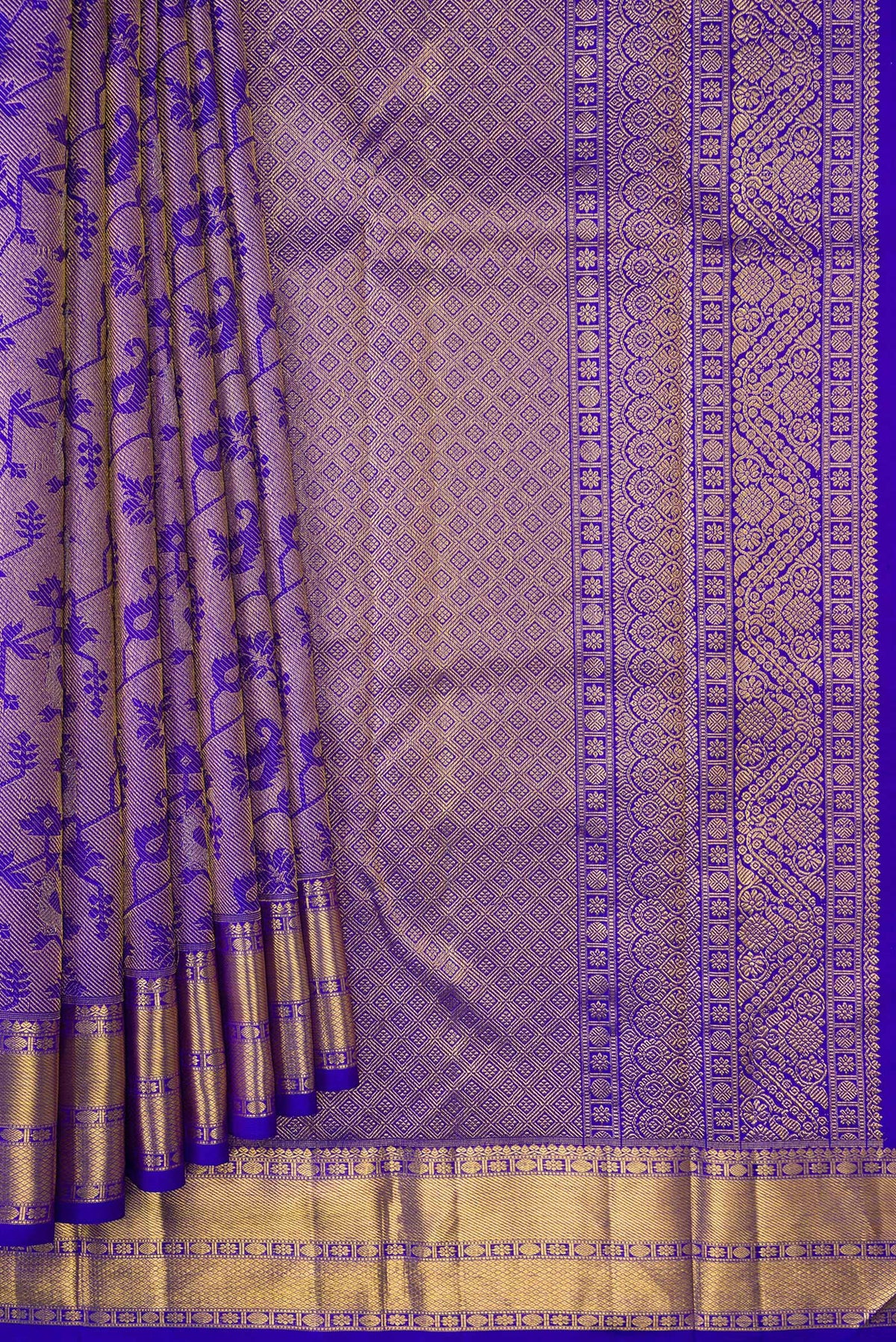 Pleats and pallu of Royal Blue Dual Tone Kanchipuram Silk Saree with Zari Brocade on the body and Zari Border. 