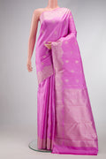 Pink Dual Tone Kanjivaram Silk Saree with Zari Butta on the body and Fancy Border.  displayed on a mannequin