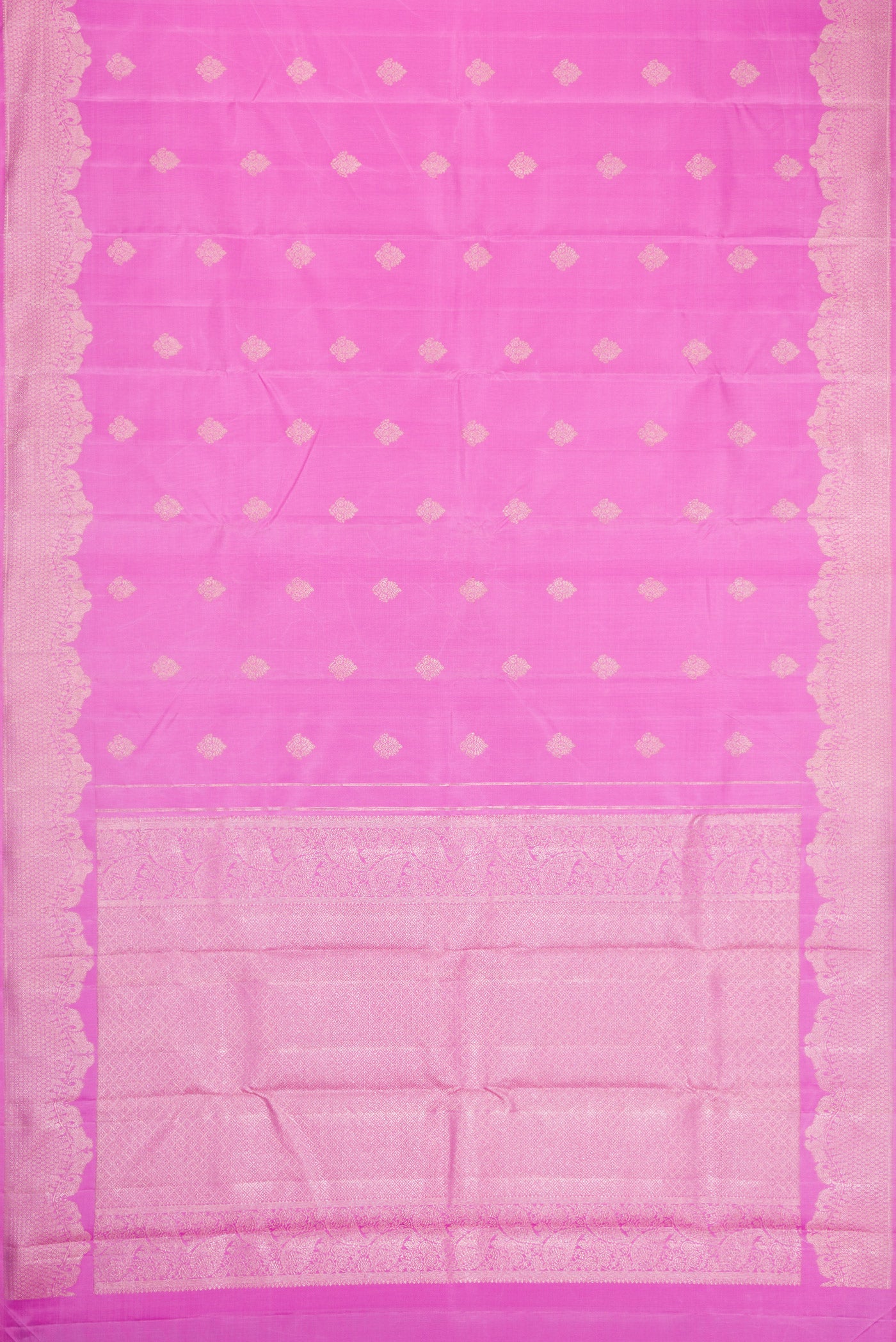 Flat view of Pink Dual Tone Kanjivaram Silk Saree with Zari Butta on the body and Fancy Border. 