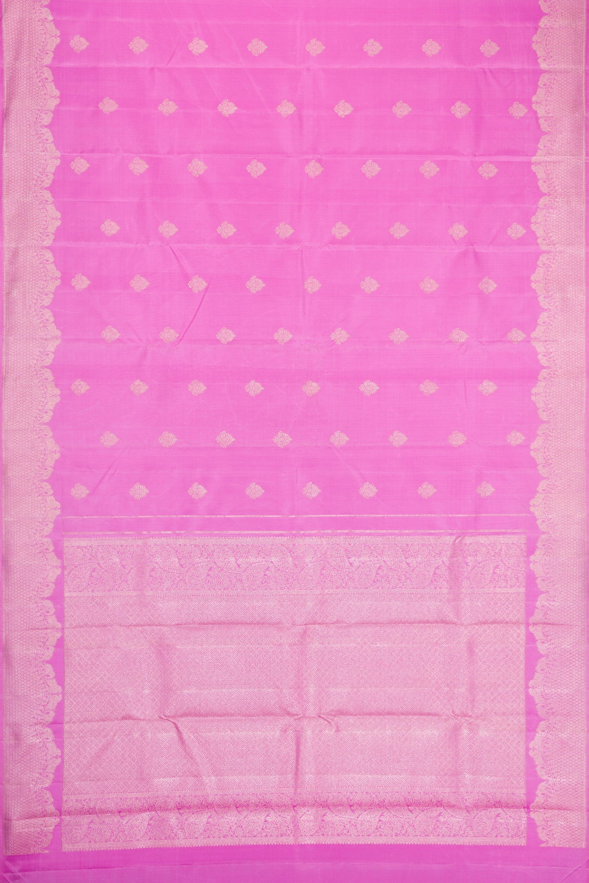 Flat view of Pink Dual Tone Kanjivaram Silk Saree with Zari Butta on the body and Fancy Border. 