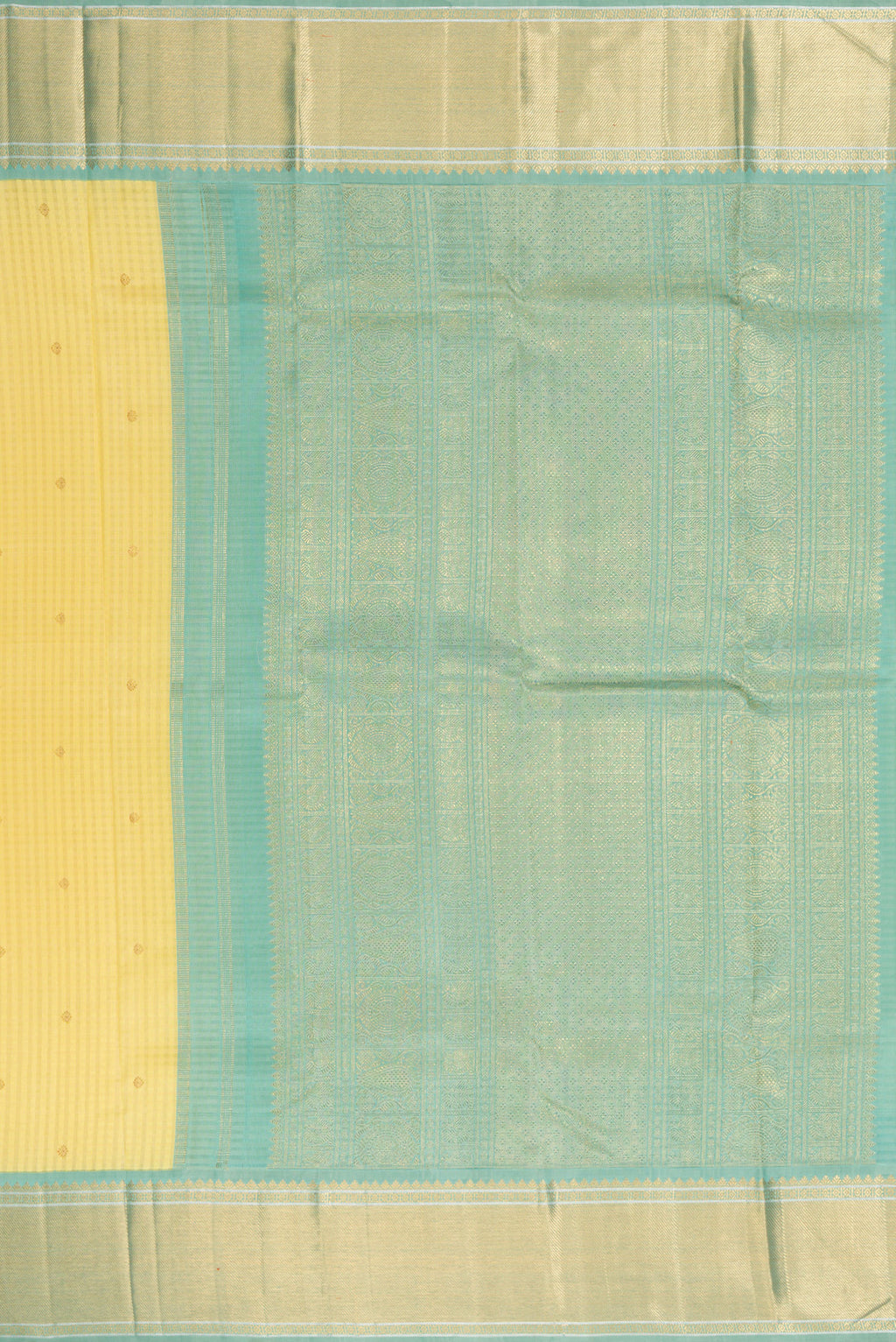 Close up image of the pallu of Pure Silk Pure Zari Sandal Dual Tone Kanjivaram Saree with Checked design on the body and Zari Border. 