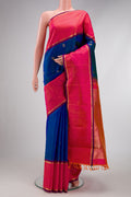 Pure Silk Pure Zari Peacock Blue Dual Tone Kanjivaram Saree with Zari Butta on the body and Zari Border.  displayed on a mannequin