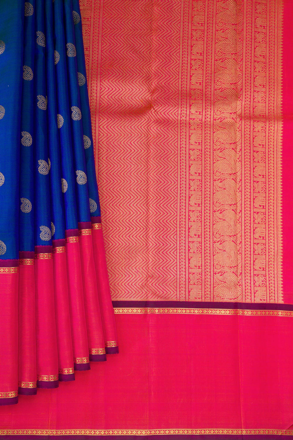 Pleats and pallu of Pure Silk Pure Zari Peacock Blue Dual Tone Kanjivaram Saree with Zari Butta on the body and Zari Border. 