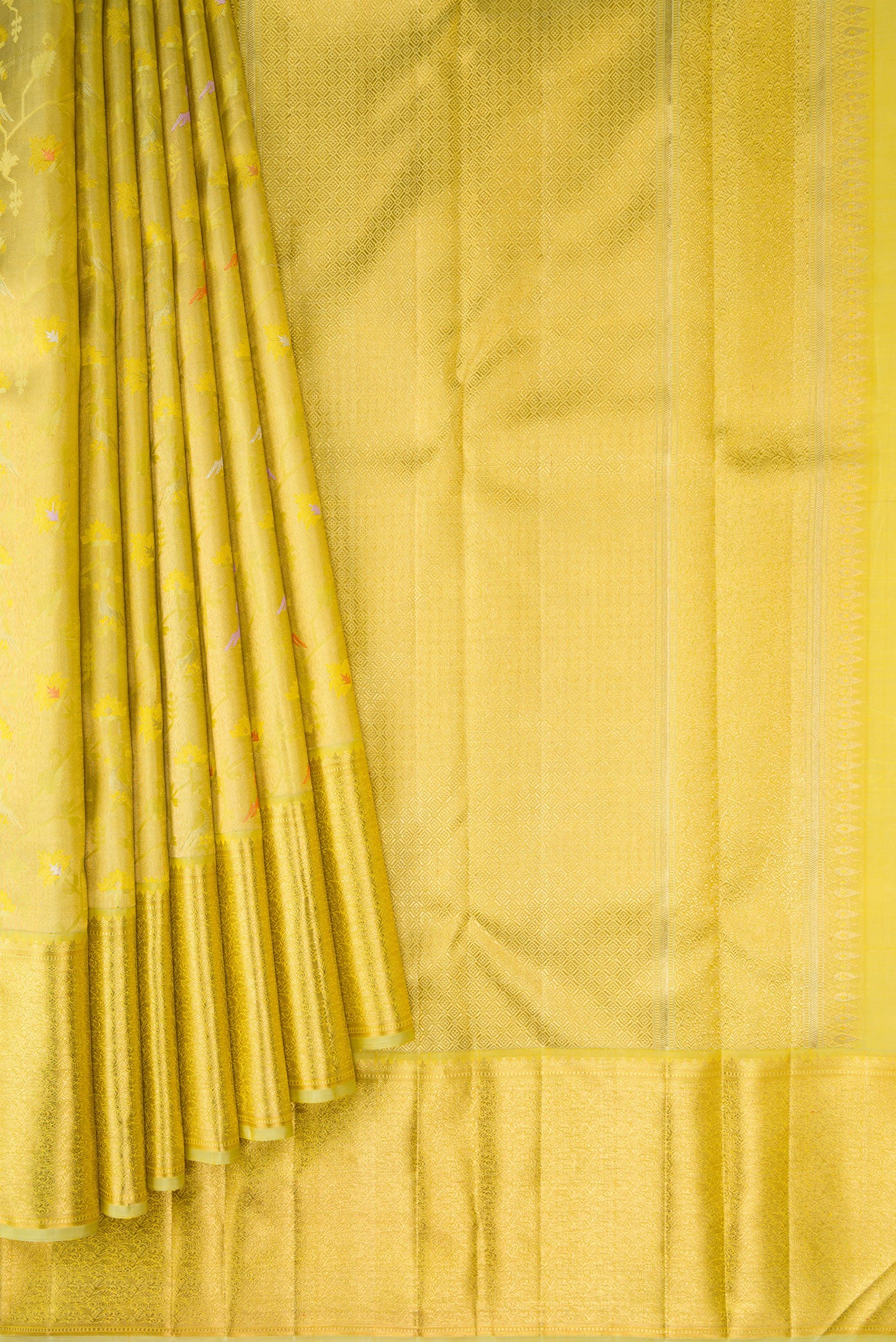Pleats and pallu of Pure Silk Pure Zari Pista Green Dual Tone Kanjivaram Saree with Zari Brocade on the body and Zari Border. 