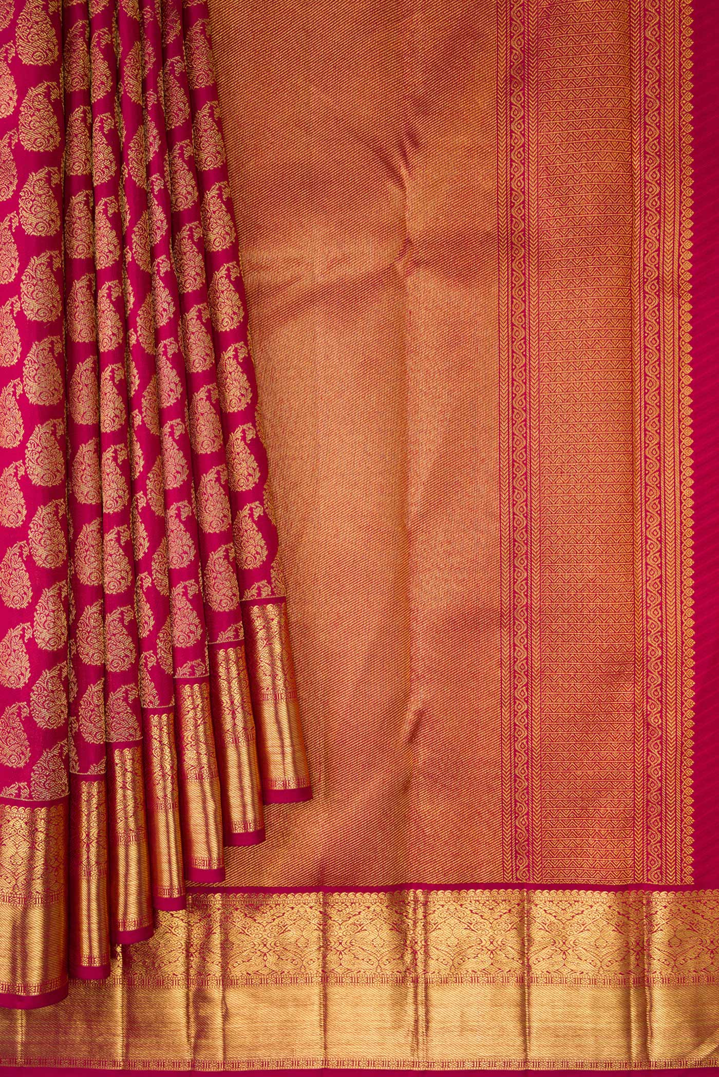 Pleats and pallu of Maroon Dual Tone Kanjivaram Silk Saree with Zari Brocade on the body and Zari Border. 