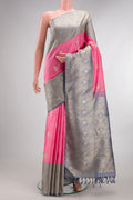 Pure Silk Pure Zari Pink Kanjivaram Saree with Zari Butta on the body and Fancy Border.  displayed on a mannequin