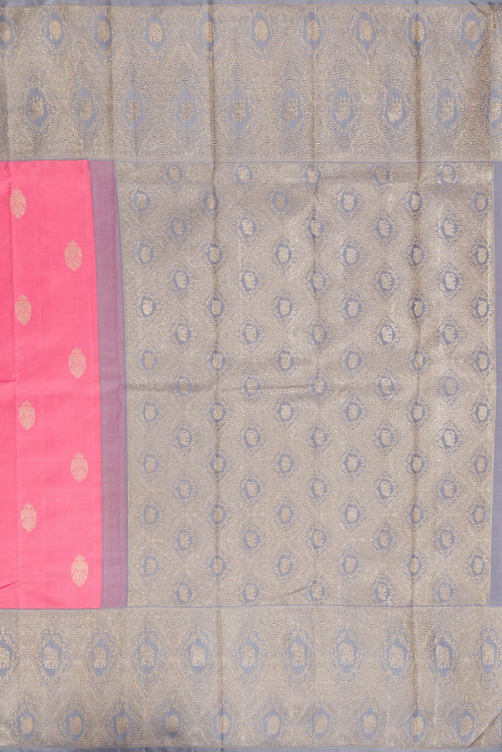 Close up image of the pallu of Pure Silk Pure Zari Pink Kanjivaram Saree with Zari Butta on the body and Fancy Border. 